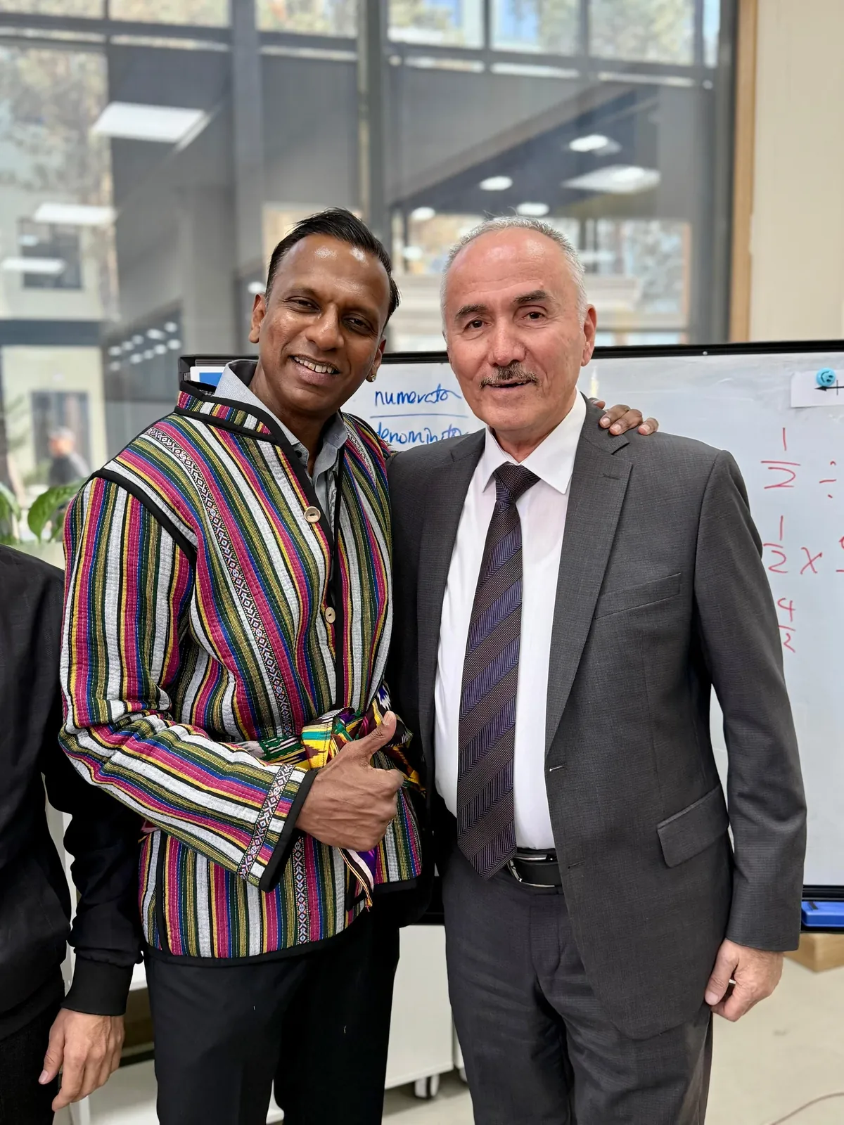 Mr Raj meeting an international education colleague
